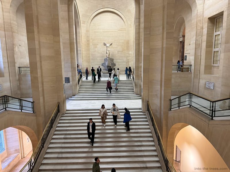 Wings of Victory at the end of a staircase.