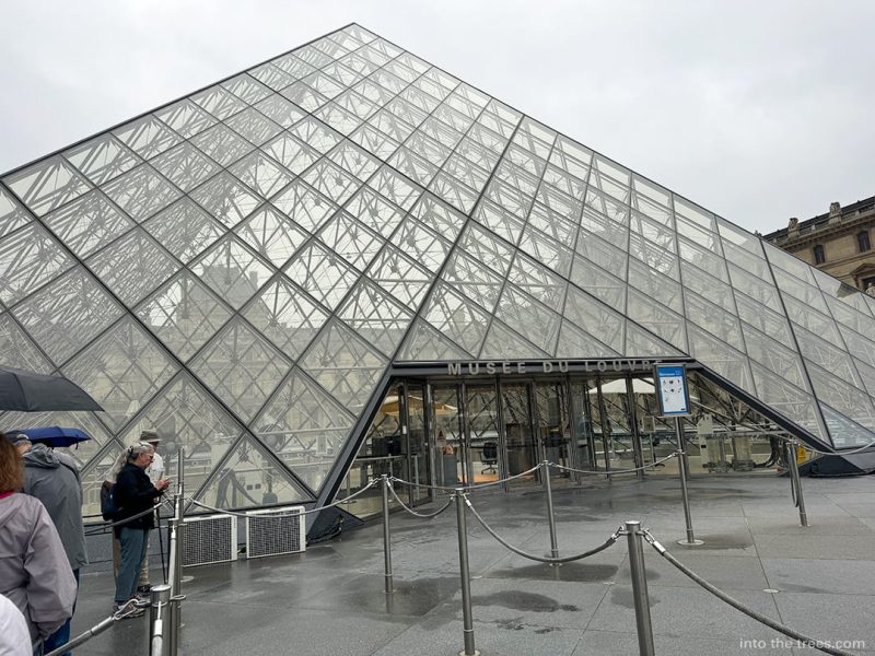 Pyramid entrance of the Louvre.